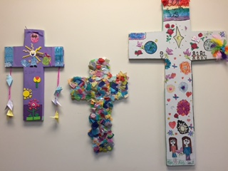 Stock image of three whimsical crosses, as if decorated by children