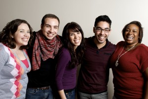 Stock photo of a mixed gender and mixed race group of younger individuals smiling
