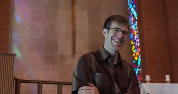 To the Point: Suggestions for Churches with a Young Pastor Photo of young pastor smiling in a church