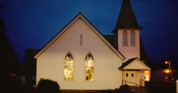 Eleven Characteristics of Effective Smaller Churches Photo of a white church building at twilight