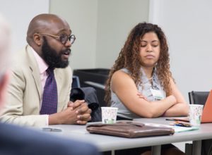 Photo of Asa Lee leading a discussion