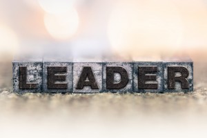 The word leader spelled out in typeset lettering