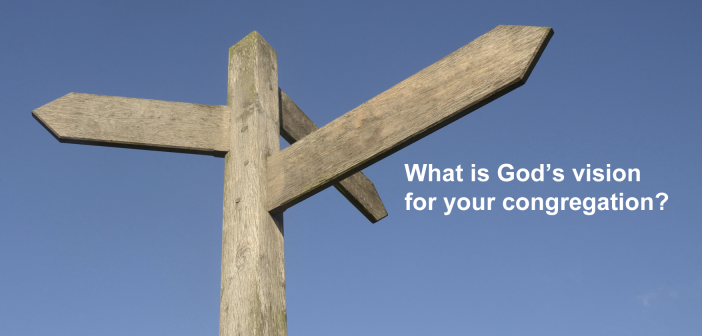 Photo of a blank wooden signpost