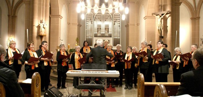 A choir in a sanctuary getting ready to sing