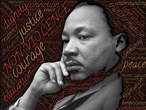 picture of Dr. Martin Luther King, Jr. in front of a word cloud