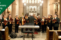 A choir in a sanctuary getting ready to sing