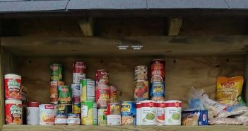 Photo of food cans in a blessing box