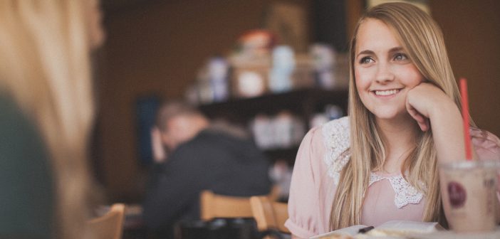 Photo of a pastor having Bible study at a coffee shop