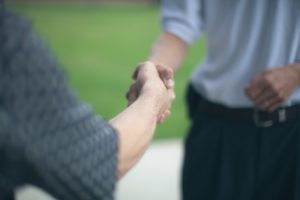 Two people meeting for the first time and forming first impressions