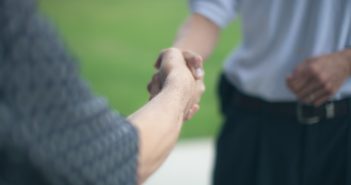 Two people meeting for the first time and forming first impressions