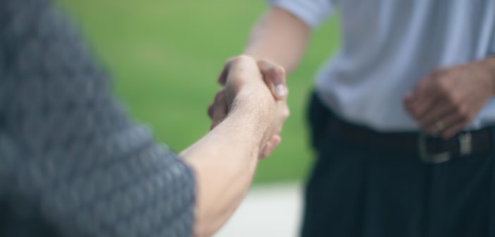 Two people meeting for the first time and forming first impressions