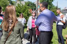 The Good Neighbor Church Photo of church members standing outside chatting with people from their neighborhood