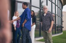 Pet Peeves of a Church Visitor Photo of church greeters shaking hands with visitors