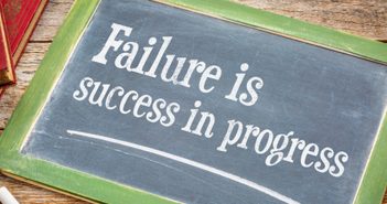 Chalk drawing of "Failure is success in progress"