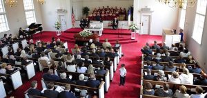 Photo of a church funeral. CREDIT: Pool / Roll Call Photos Inc. / Newscom / Universal Images Group. Rights Managed