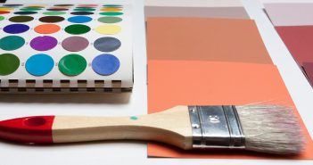 Photo of a paint brush and color swatches