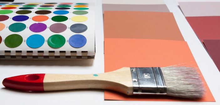 Photo of a paint brush and color swatches