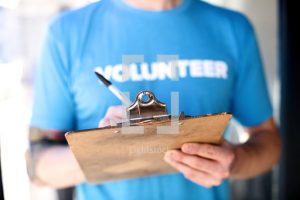 volunteer with clipboard