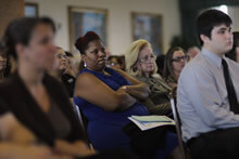 Photo of a congregation listening to a sermon