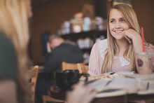 Photo of a pastor in conversation at a coffee shop