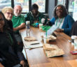Rev. Jasmine Smothers and some multicultural members of her congregation