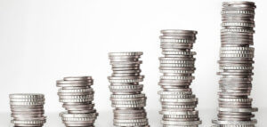 Stacks of coins growing higher and higher