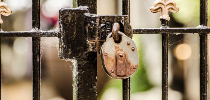 Padlock on an old church gate