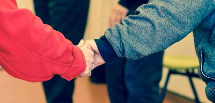 Closeup of two clasped hands