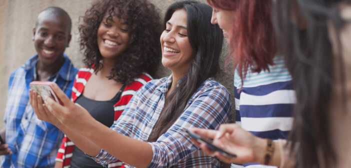 Diverse group of millennials taking a selfie