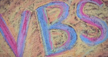 VBS drawn in sidewalk chalk