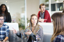 5 Ways Female Leaders Undermine Themselves Woman leading a group meeting