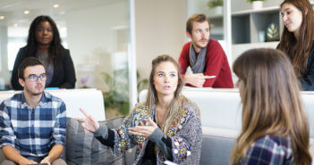 Woman leading a group meeting