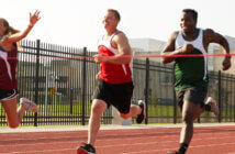 Planning for a Strong Finish to Your Stewardship Campaign Runner surging ahead to cross the finish line ahead of other runners in a race