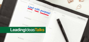 Lead with purpose! handwritten on a Franklin Planner page