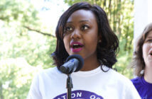 5 Reasons the Church Still Needs Young Clergy Casually-dressed pastor speaking into a microphone outside