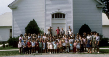 Vintage group photo of a congregation out front of the old Dawson Baptist Church in Philpot, Ky.