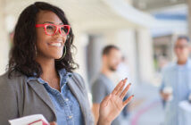 Friendly person welcoming others to worship