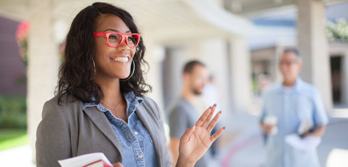 Friendly person welcoming others to worship