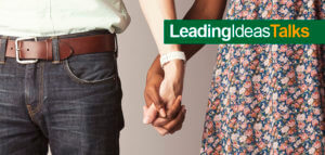 Mixed-race couple holding hands