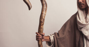 Shepherd holding a staff