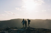 Choose Your Hills Wisely Hikers atop a large hill