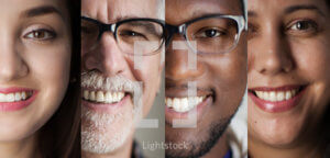 Smiling faces of diverse people