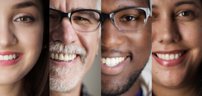 Four diverse smiling faces