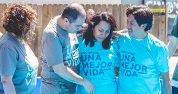 Outdoor baptism in a swimming pool