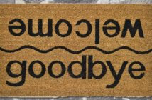 Floor mat that reads goodbye on one side and welcome on the other