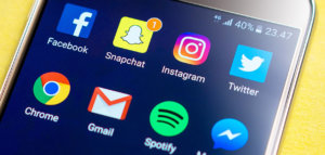 Social media apps on a smartphone screen
