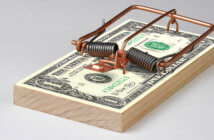 5 Habits Your Church Must Unlearn to Increasing Giving Mouse trap on a stack of cash bills