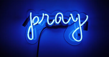 Pray written in neon