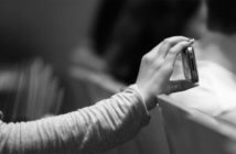 5 Keys to Great Online Worship Hospitality Person filming worship on a mobile phone