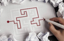 5 Ways to Overcome Common Obstacles to Change Person working successfully through a maze on pen and paper